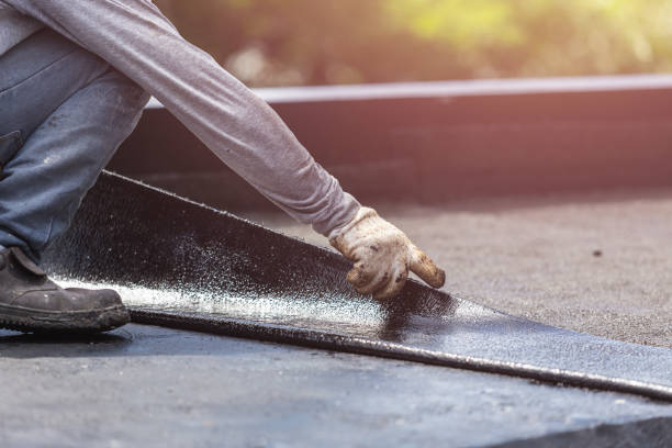 Professional Waterproofing technician working in Glencoe, KY